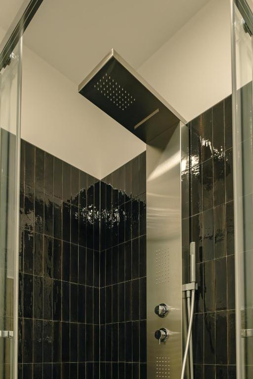 Koupelna v ubytování Camoma Aparthotel - Suites Apartments