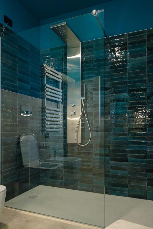 Koupelna v ubytování Camoma Aparthotel - Suites Apartments
