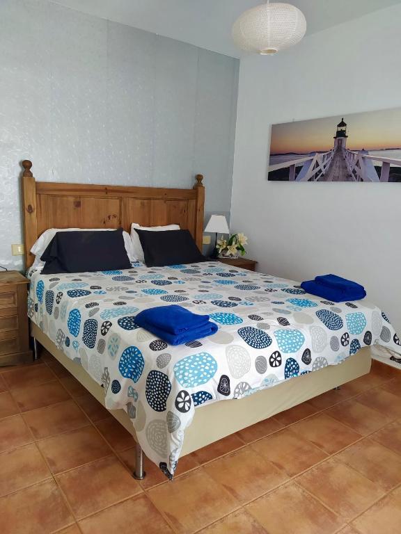 A bed or beds in a room at Casa El Rincon Azul