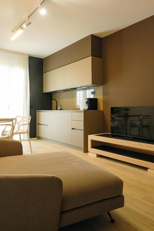 Kuchyň nebo kuchyňský kout v ubytování Camoma Aparthotel - Suites Apartments
