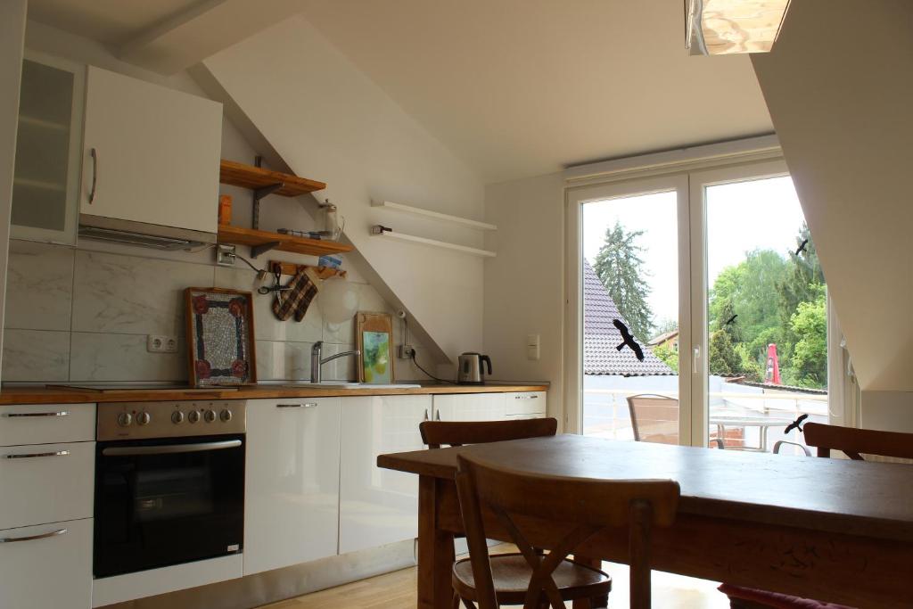 Kuchyň nebo kuchyňský kout v ubytování Ferienwohnung am Teupitzsee