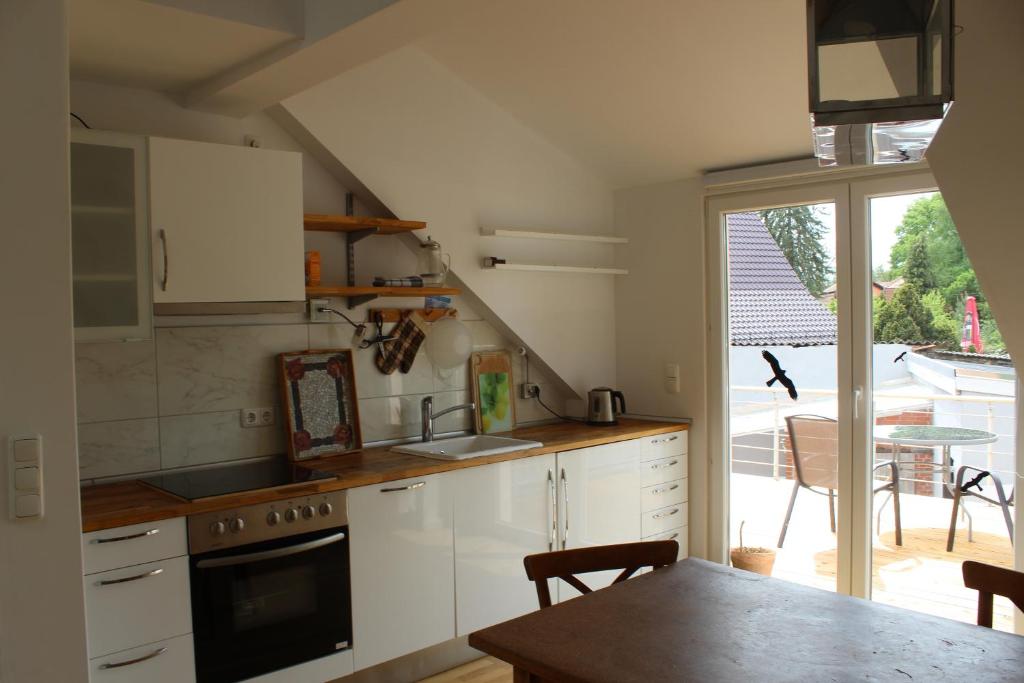 Kuchyň nebo kuchyňský kout v ubytování Ferienwohnung am Teupitzsee