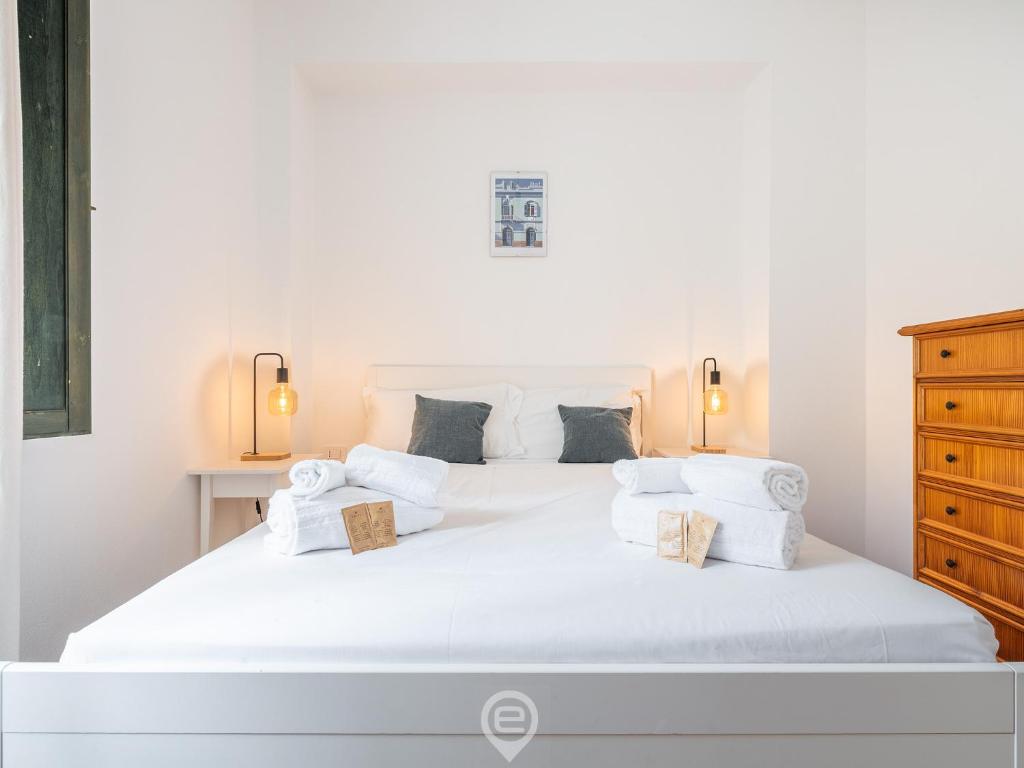 Postel nebo postele na pokoji v ubytování Casa Flamingo