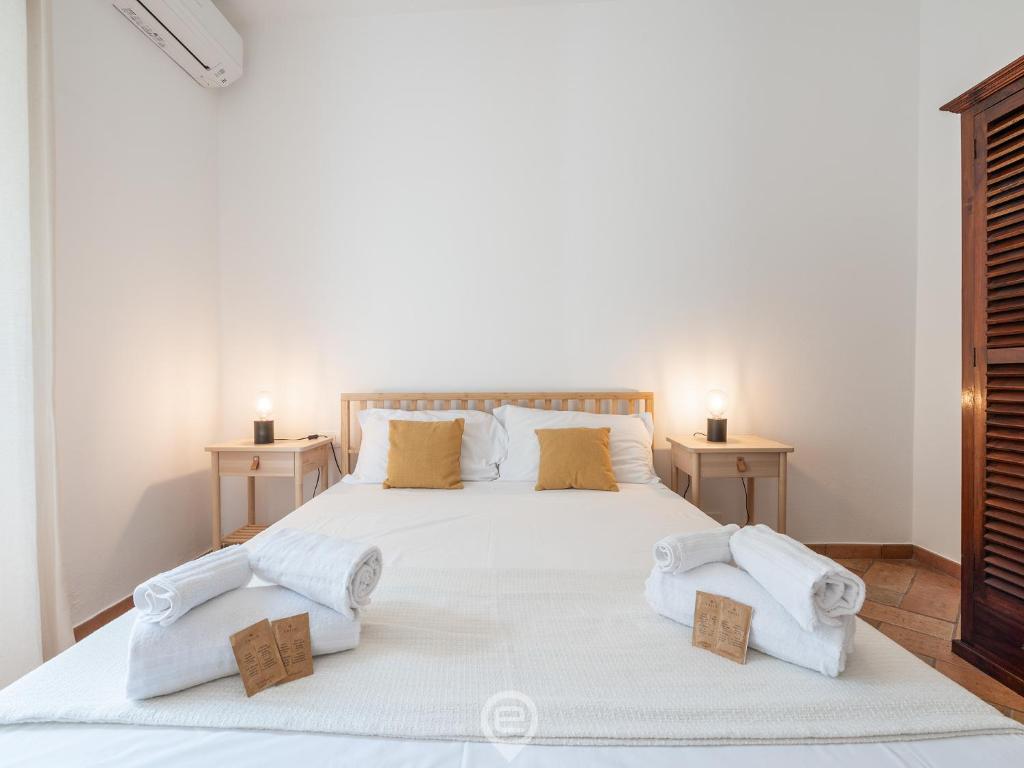 Postel nebo postele na pokoji v ubytování Casa Flamingo