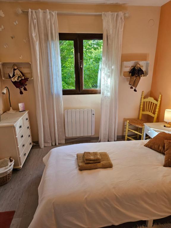 Postel nebo postele na pokoji v ubytování Casa Los Flamencos