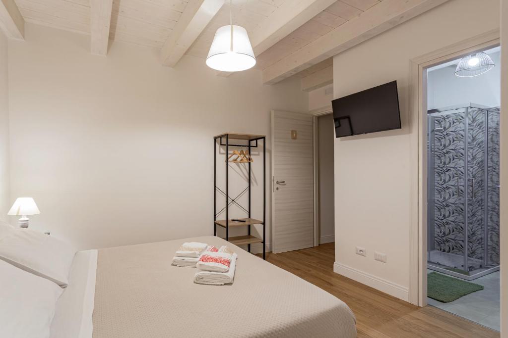 Posteľ alebo postele v izbe v ubytovaní B&B Vico Suites
