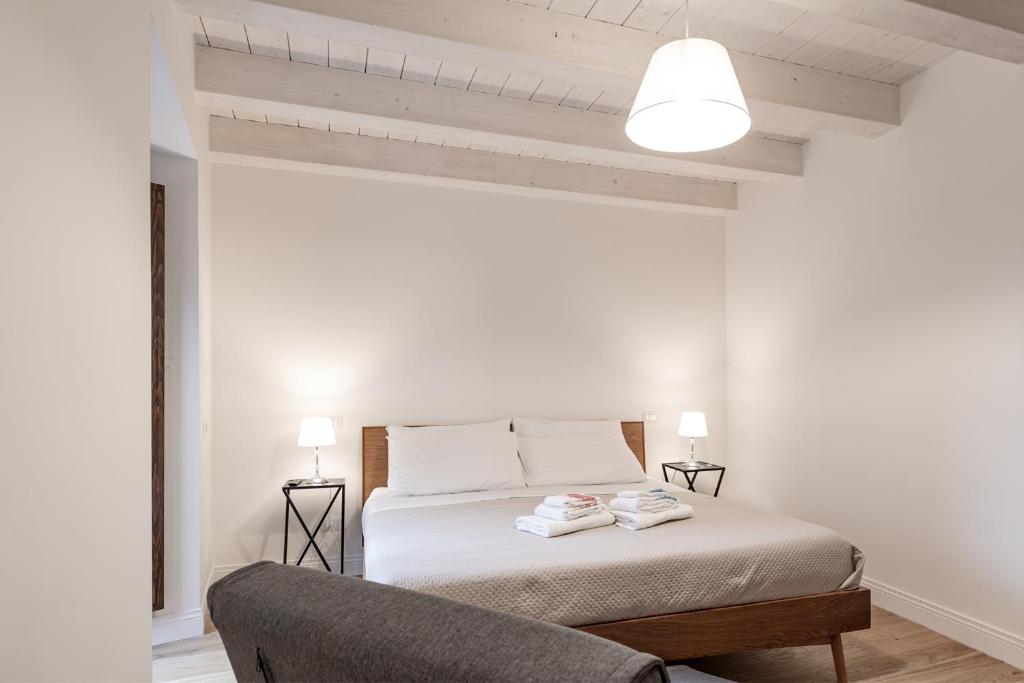Posteľ alebo postele v izbe v ubytovaní B&B Vico Suites