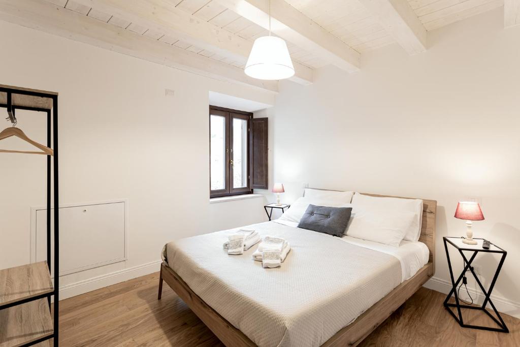 Posteľ alebo postele v izbe v ubytovaní B&B Vico Suites