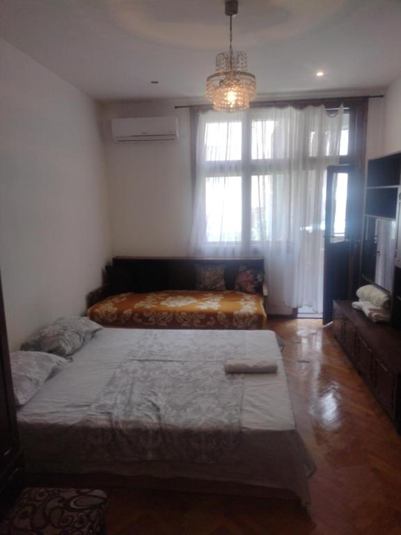 Ένα ή περισσότερα κρεβάτια σε δωμάτιο στο 27 юли 3 бюджет