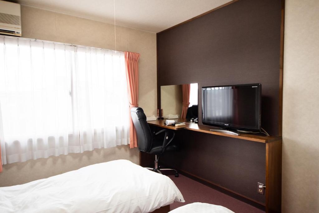 TV a/nebo společenská místnost v ubytování Yamato Saidaiji Hotel SINDAI