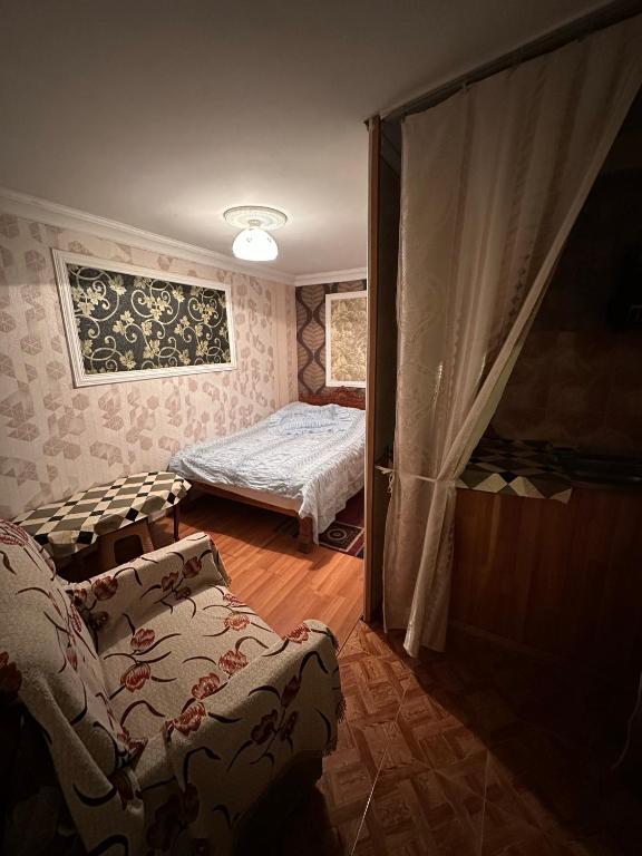 Postel nebo postele na pokoji v ubytování Guest House Iura