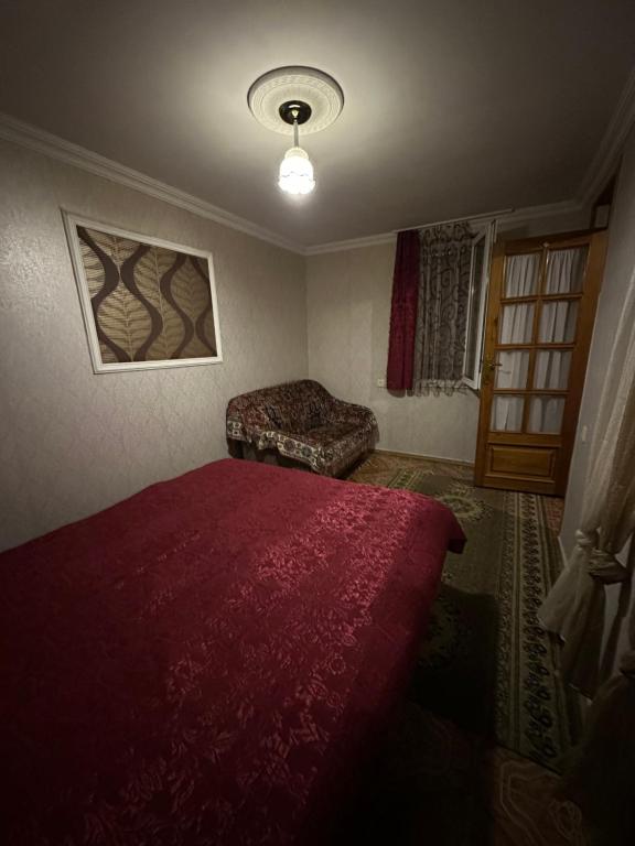 Postel nebo postele na pokoji v ubytování Guest House Iura