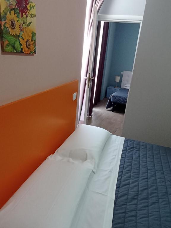 Postel nebo postele na pokoji v ubytování Camere Girasole