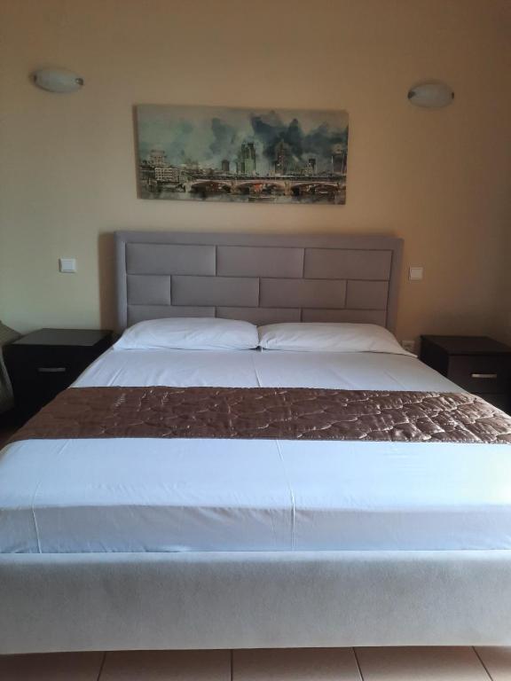 Postel nebo postele na pokoji v ubytování Avanda Rooms