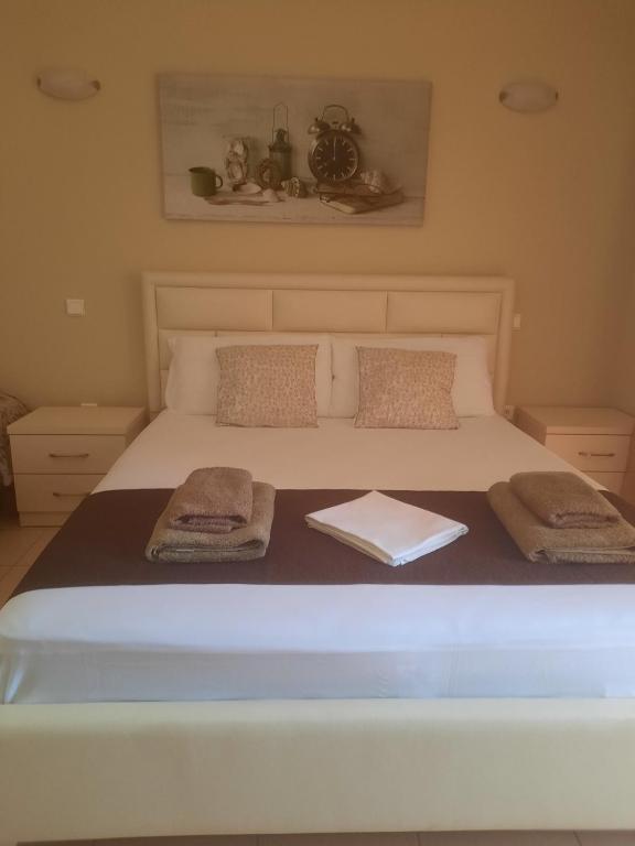 Postel nebo postele na pokoji v ubytování Avanda Rooms