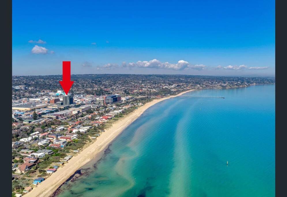 an aerial view of a beach with a red arrow at Beachfront Studio Apartment in Frankston Melbourne in Frankston