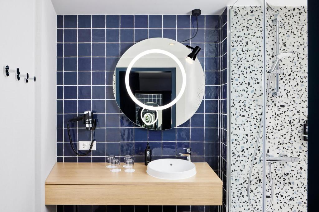 Koupelna v ubytování H2 Hotel Wien Schönbrunn
