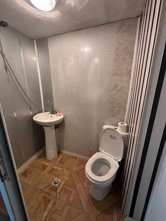 Koupelna v ubytování Guest House Iura