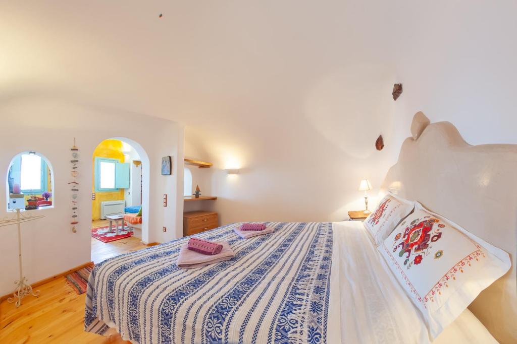 Кровать или кровати в номере En Pori Houses