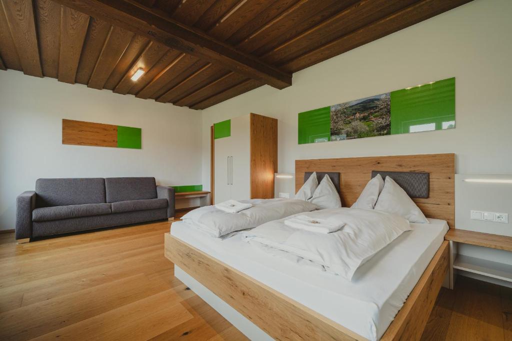 Postel nebo postele na pokoji v ubytování Hotel Semriacherhof