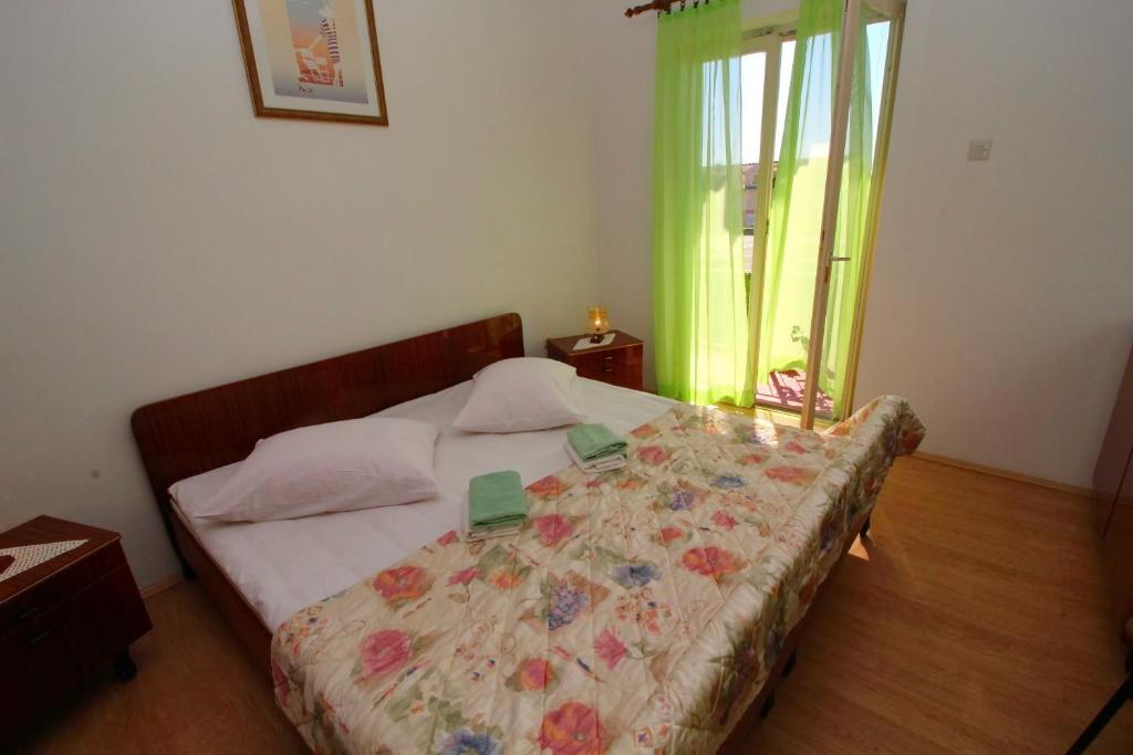 Postel nebo postele na pokoji v ubytování Apartment Domestic