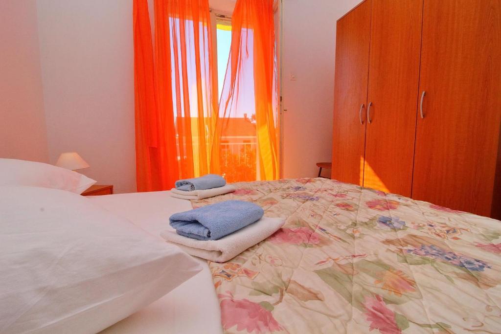 Postel nebo postele na pokoji v ubytování Apartment Domestic