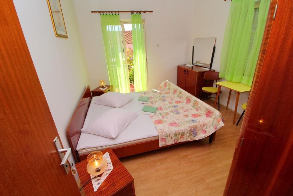 Postel nebo postele na pokoji v ubytování Apartment Domestic