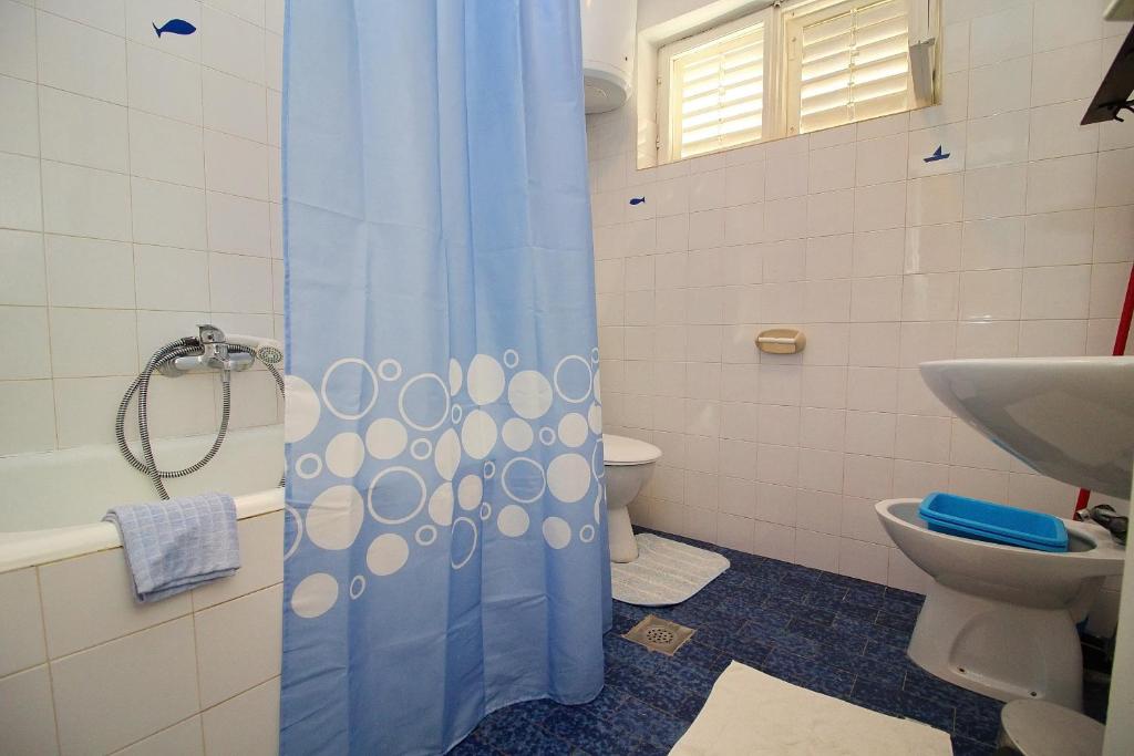 Koupelna v ubytování Apartment Domestic