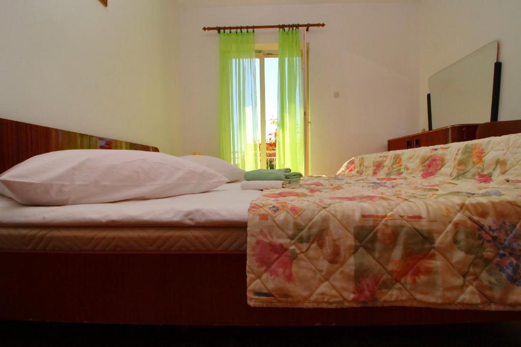 Postel nebo postele na pokoji v ubytování Apartment Domestic