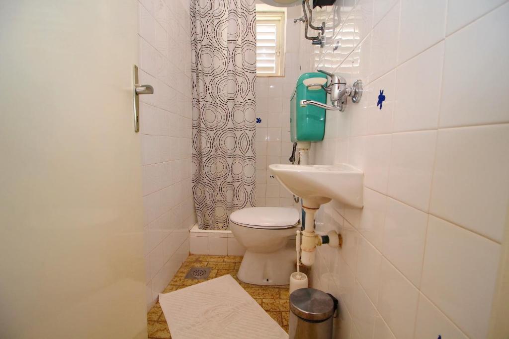 Koupelna v ubytování Apartment Domestic