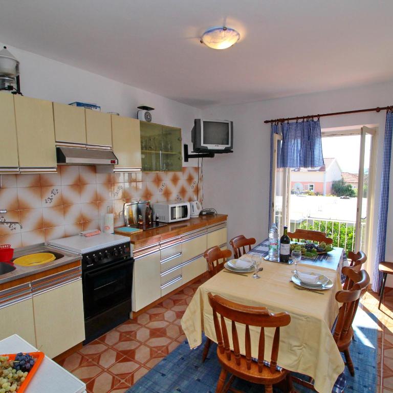 Kuchyň nebo kuchyňský kout v ubytování Apartment Domestic
