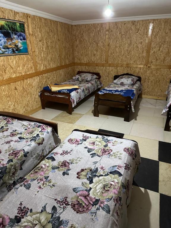 Postel nebo postele na pokoji v ubytování Guest House Iura