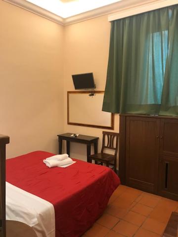 Postel nebo postele na pokoji v ubytování Hotel Panda