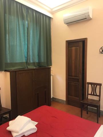 Postel nebo postele na pokoji v ubytování Hotel Panda