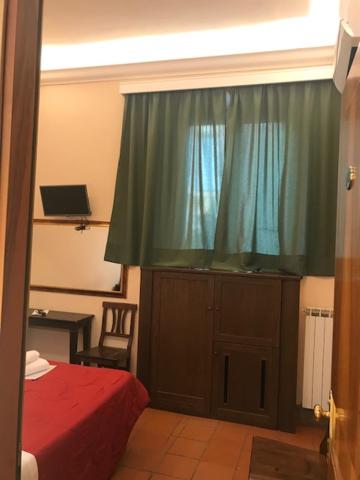 Postel nebo postele na pokoji v ubytování Hotel Panda