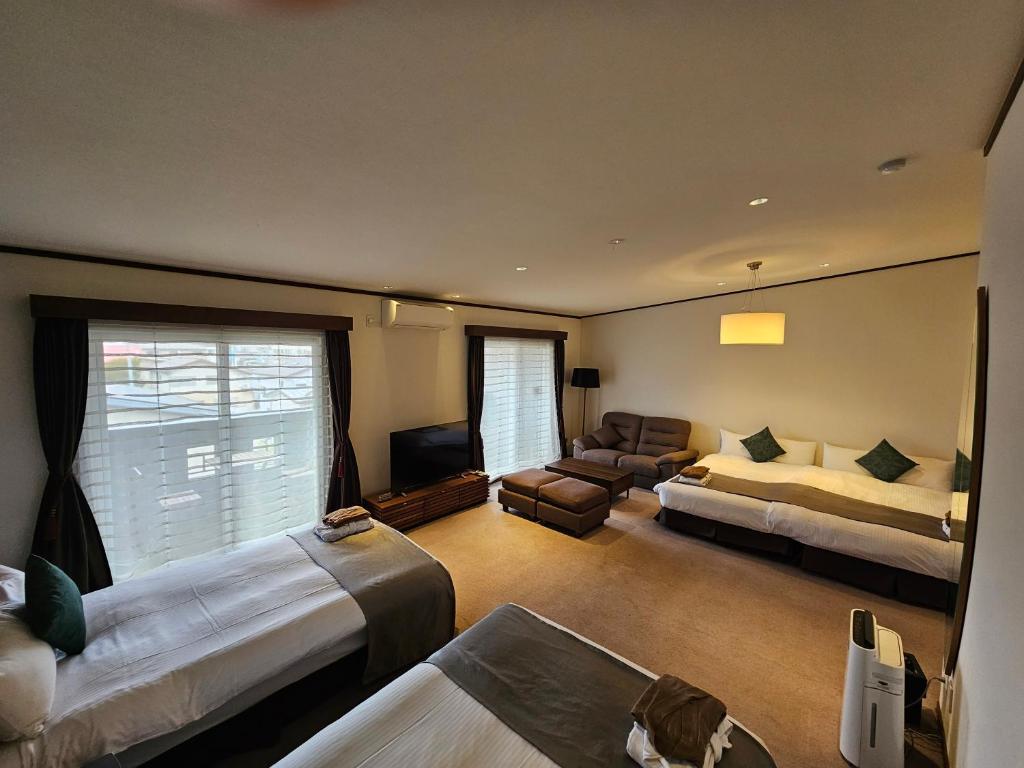 Postel nebo postele na pokoji v ubytování Hotel Grand Vert Kyu Karuizawa