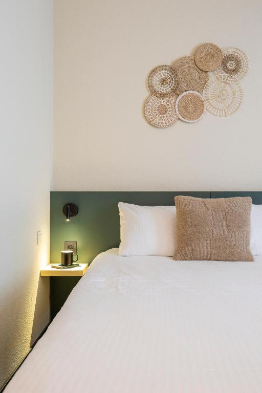 Postel nebo postele na pokoji v ubytování Green Park Hotel Brugge