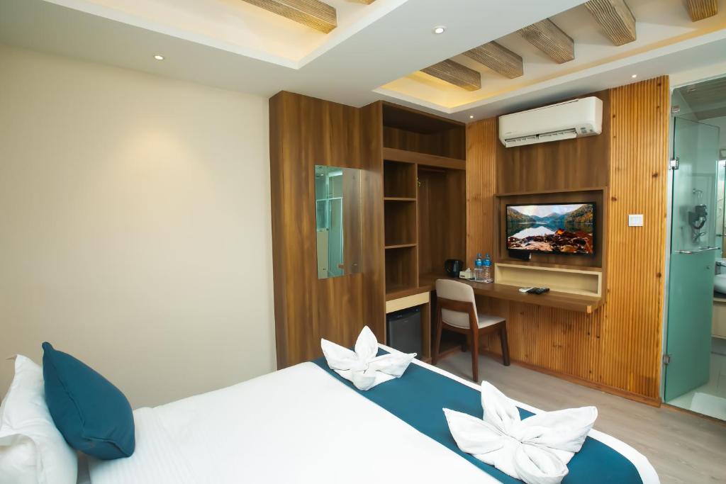 Postel nebo postele na pokoji v ubytování Hotel Maya Boutique & Apartment