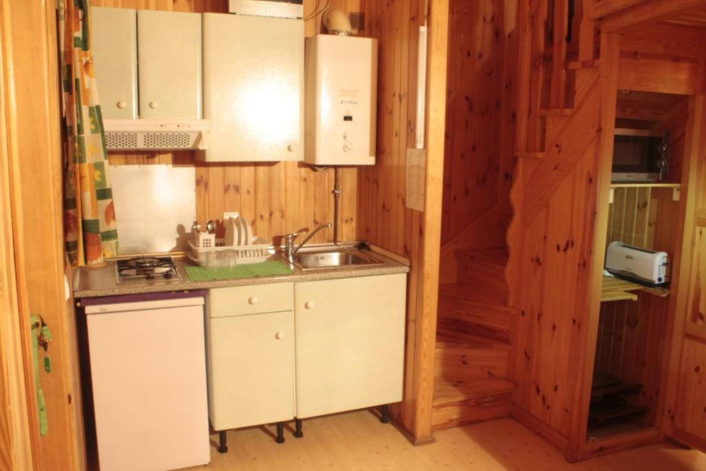 Kuchyň nebo kuchyňský kout v ubytování Camping Boneta