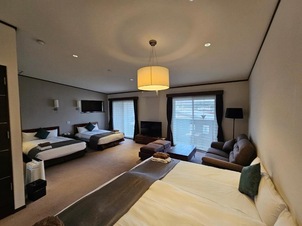 Postel nebo postele na pokoji v ubytování Hotel Grand Vert Kyu Karuizawa