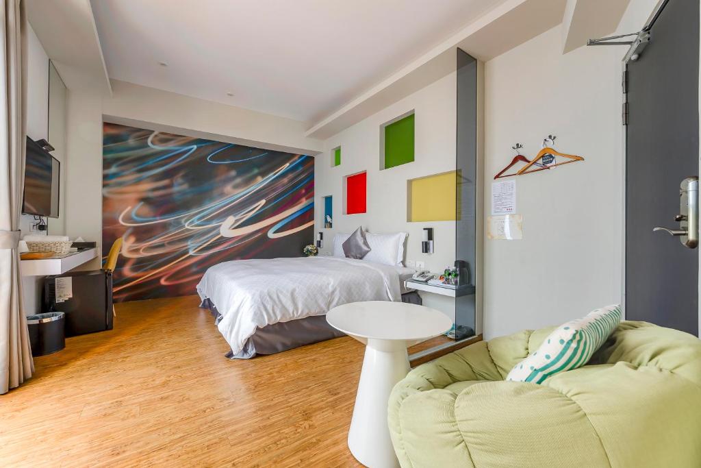 Postel nebo postele na pokoji v ubytování Pacific Inn