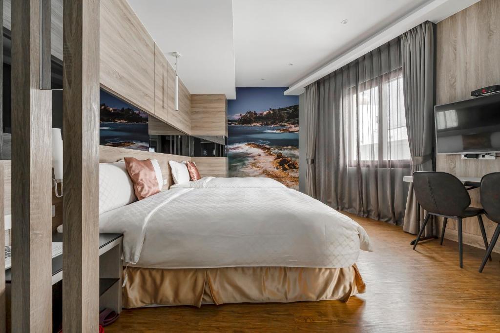 Voodi või voodid majutusasutuse Pacific Inn toas