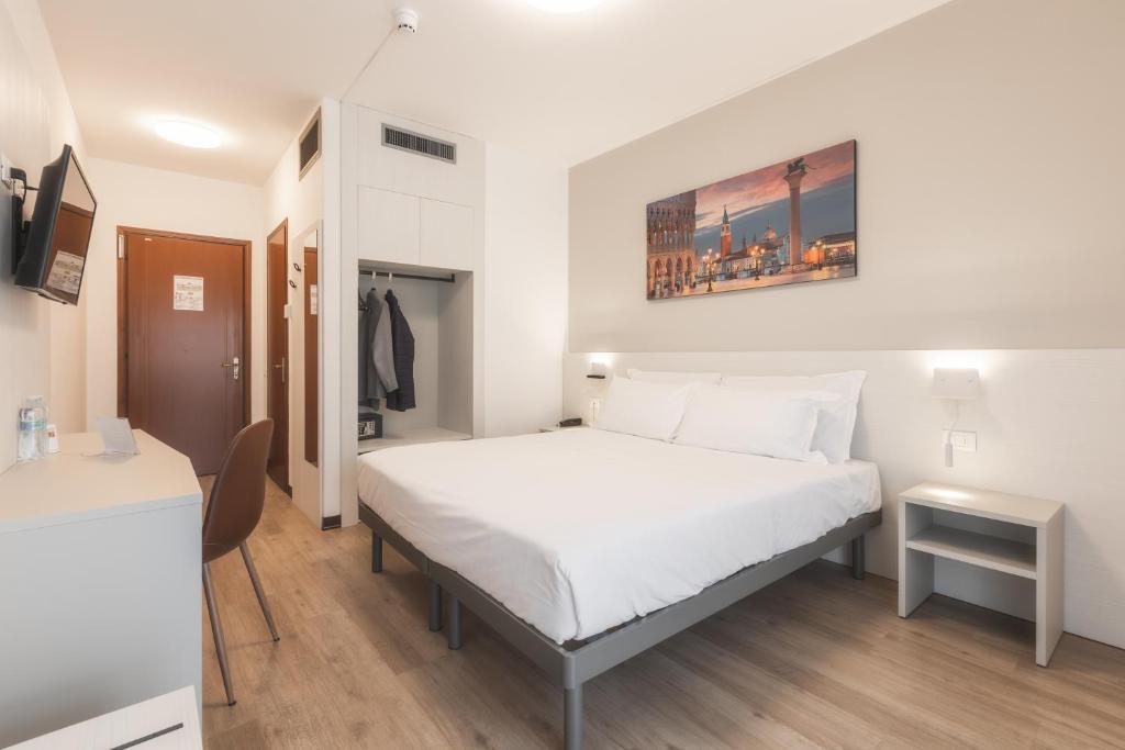 Postel nebo postele na pokoji v ubytování CENTRO HOTEL - Venice Airport