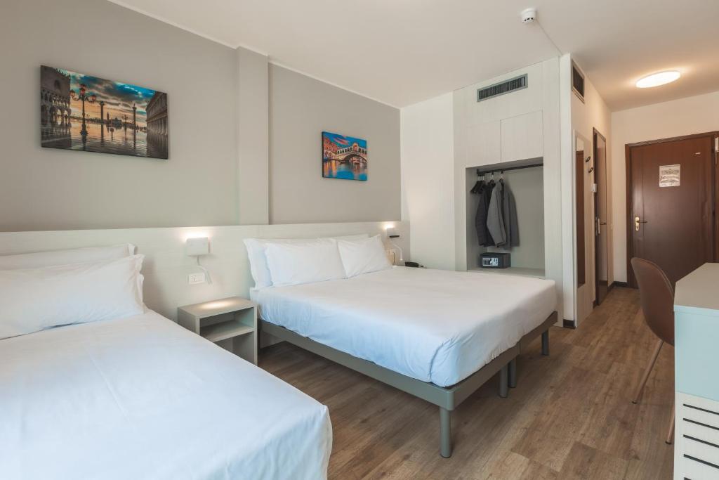 Postel nebo postele na pokoji v ubytování CENTRO HOTEL - Venice Airport