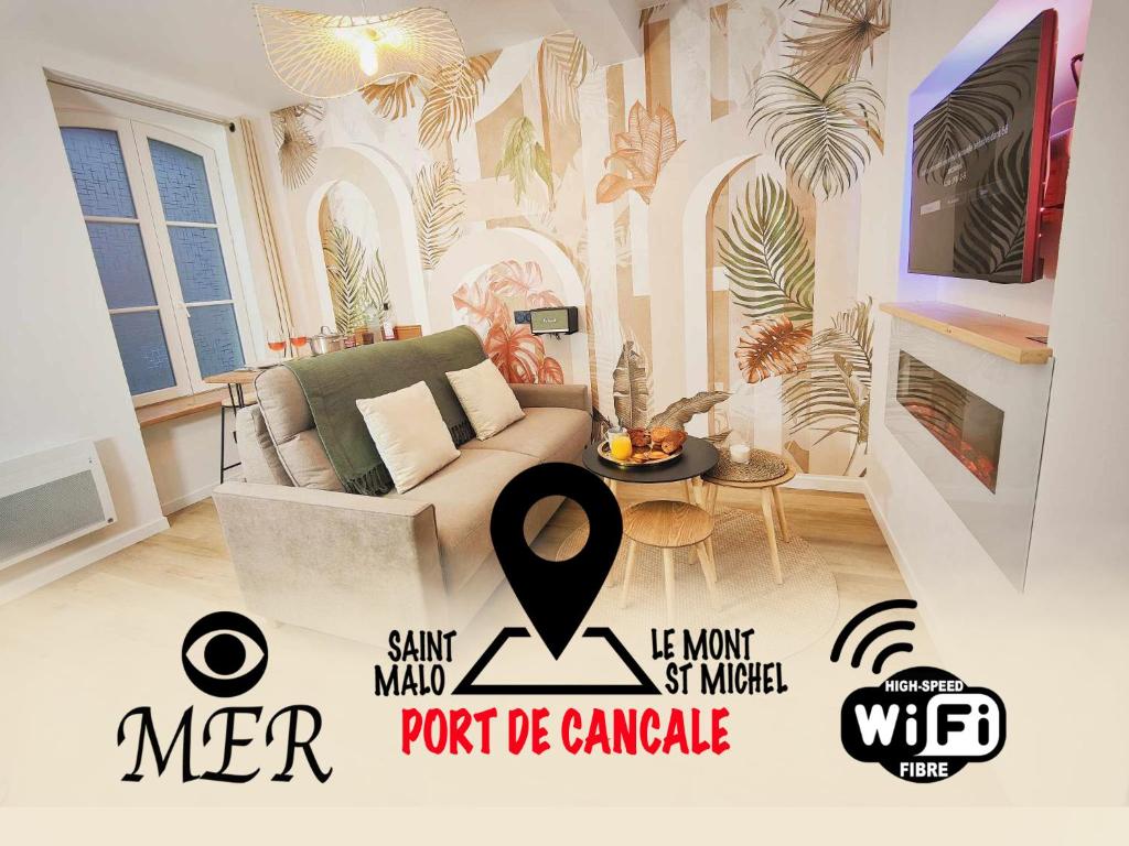 a living room with a couch and a room with a map at La MerVeille / MRODBnB in Cancale