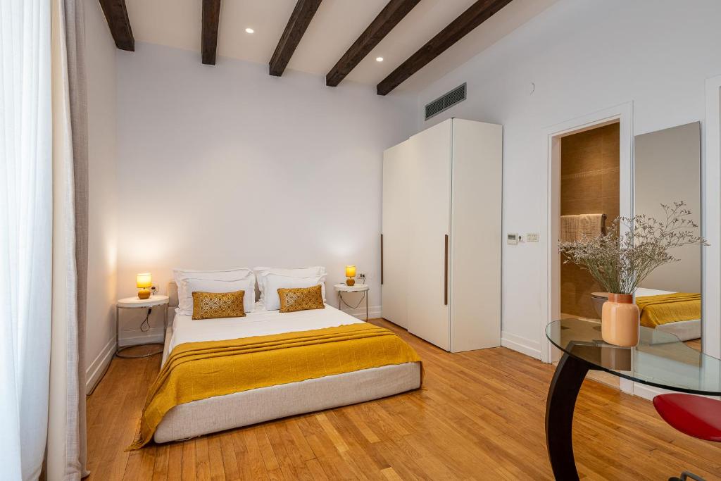 Posteľ alebo postele v izbe v ubytovaní Blasius Residence