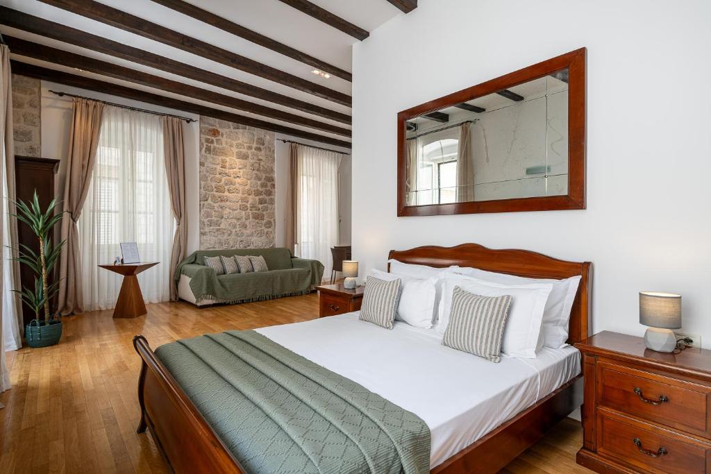 Posteľ alebo postele v izbe v ubytovaní Blasius Residence