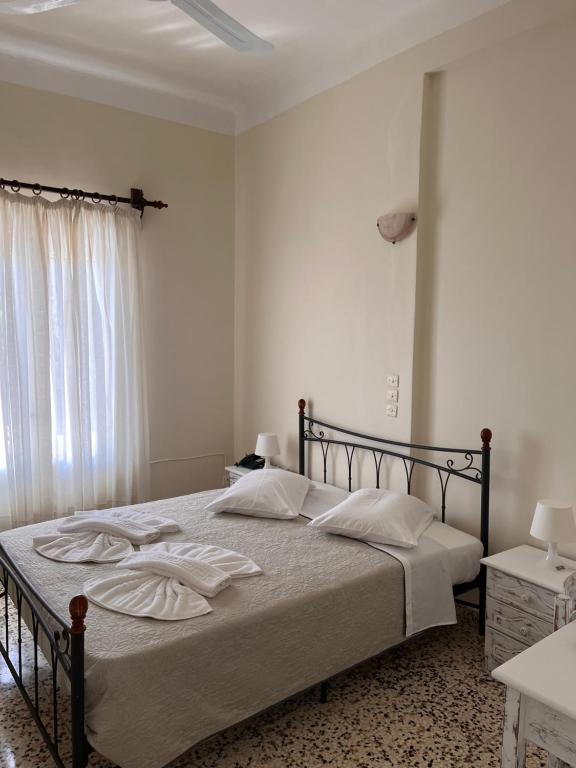 Postel nebo postele na pokoji v ubytování Alinda Hotel