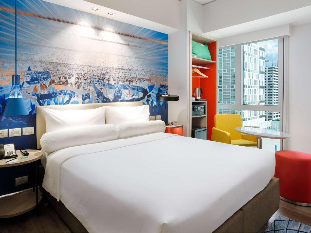 Voodi või voodid majutusasutuse ibis Styles Manila Araneta City toas