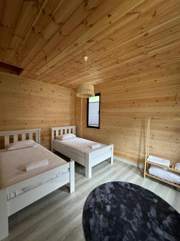 Postel nebo postele na pokoji v ubytování Karadeniz River Palace